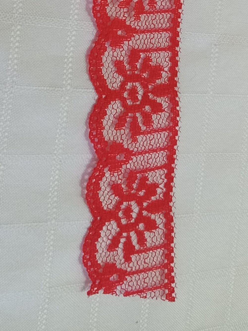 6 meters x 1 1/4 inches of brand-new, non-stretch vintage red lace ribbon